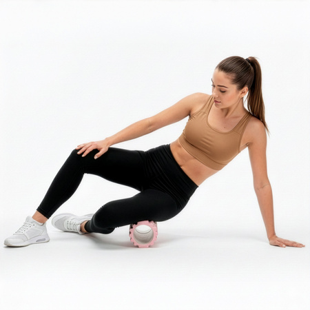 Roller fitness do masażu ciała, średnio twardy, wałek z wypustkami, różowy